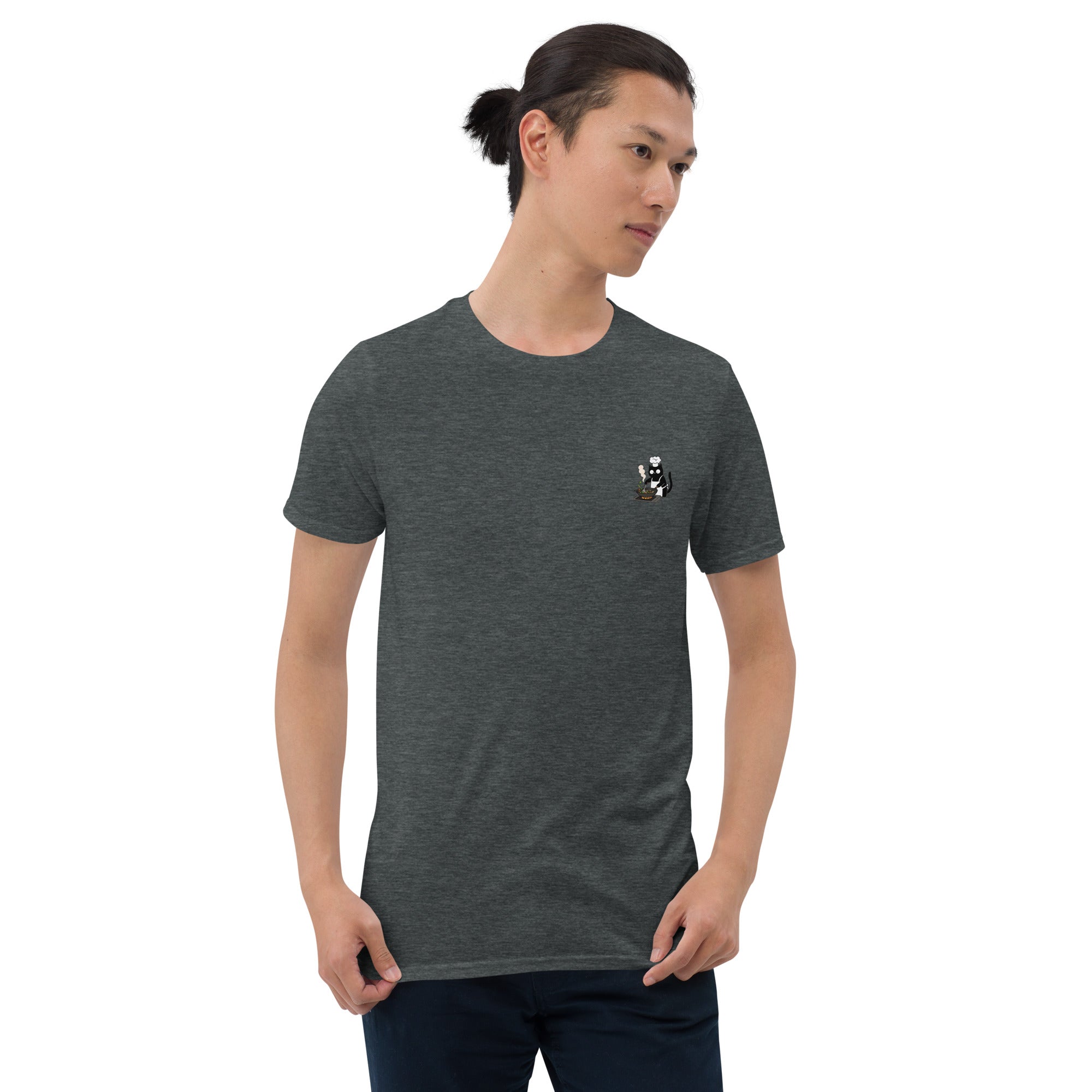 Man wearing a dark gray t-shirt with a cat logo on a white background