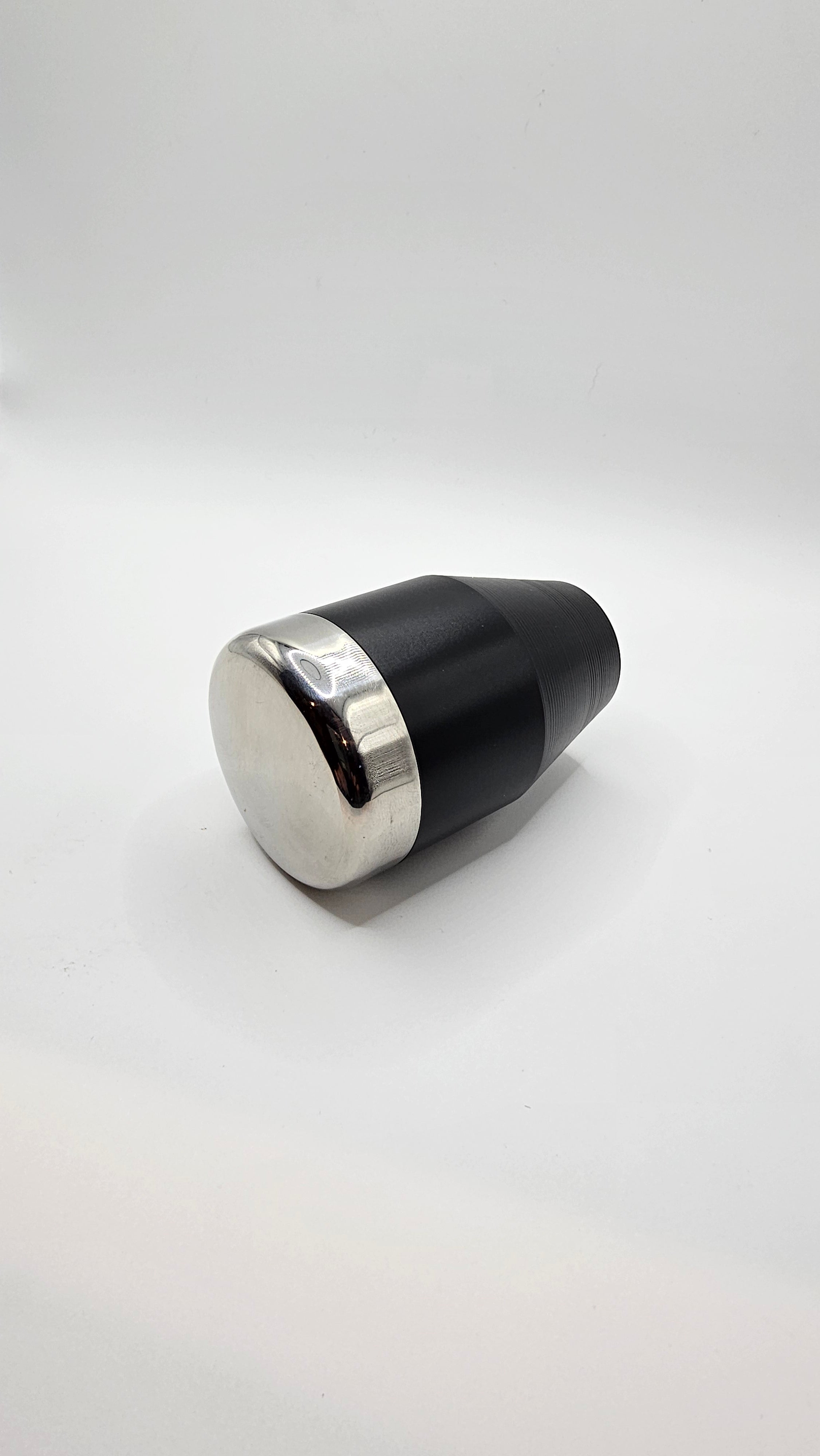 Black and silver cylindrical object on a white background, shift knob, nissan, toyota, mazda, stainless steel
