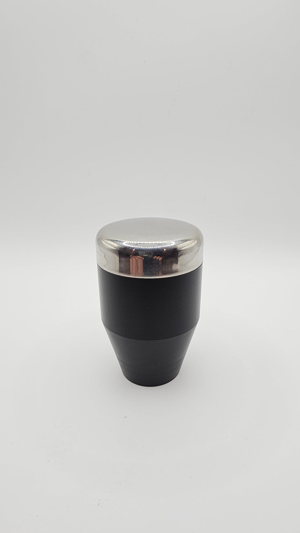 Black and silver cylindrical object on a white background, shift knob, nissan, toyota, mazda, stainless steel