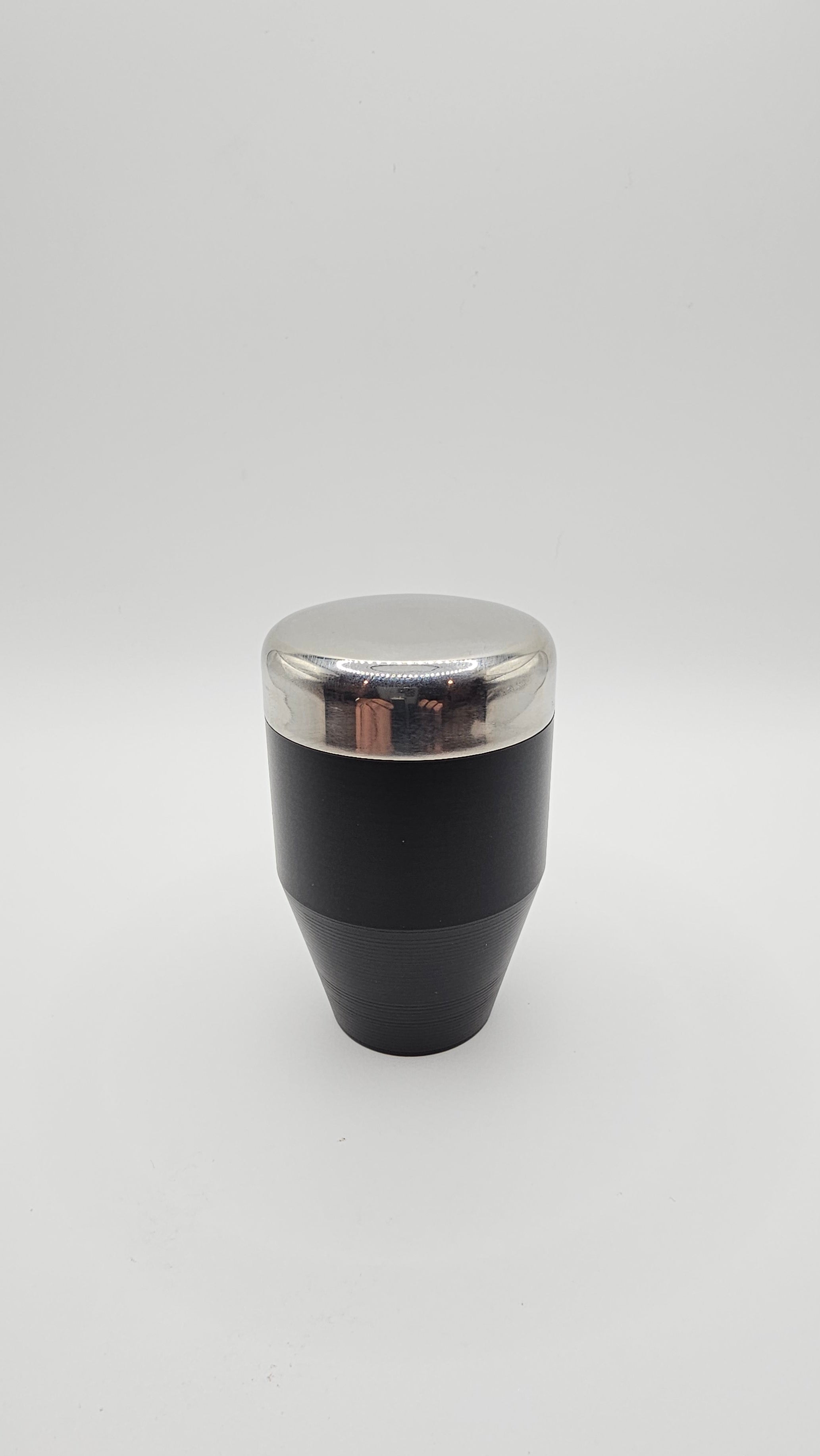 Black and silver cylindrical object on a white background, shift knob, nissan, toyota, mazda, stainless steel
