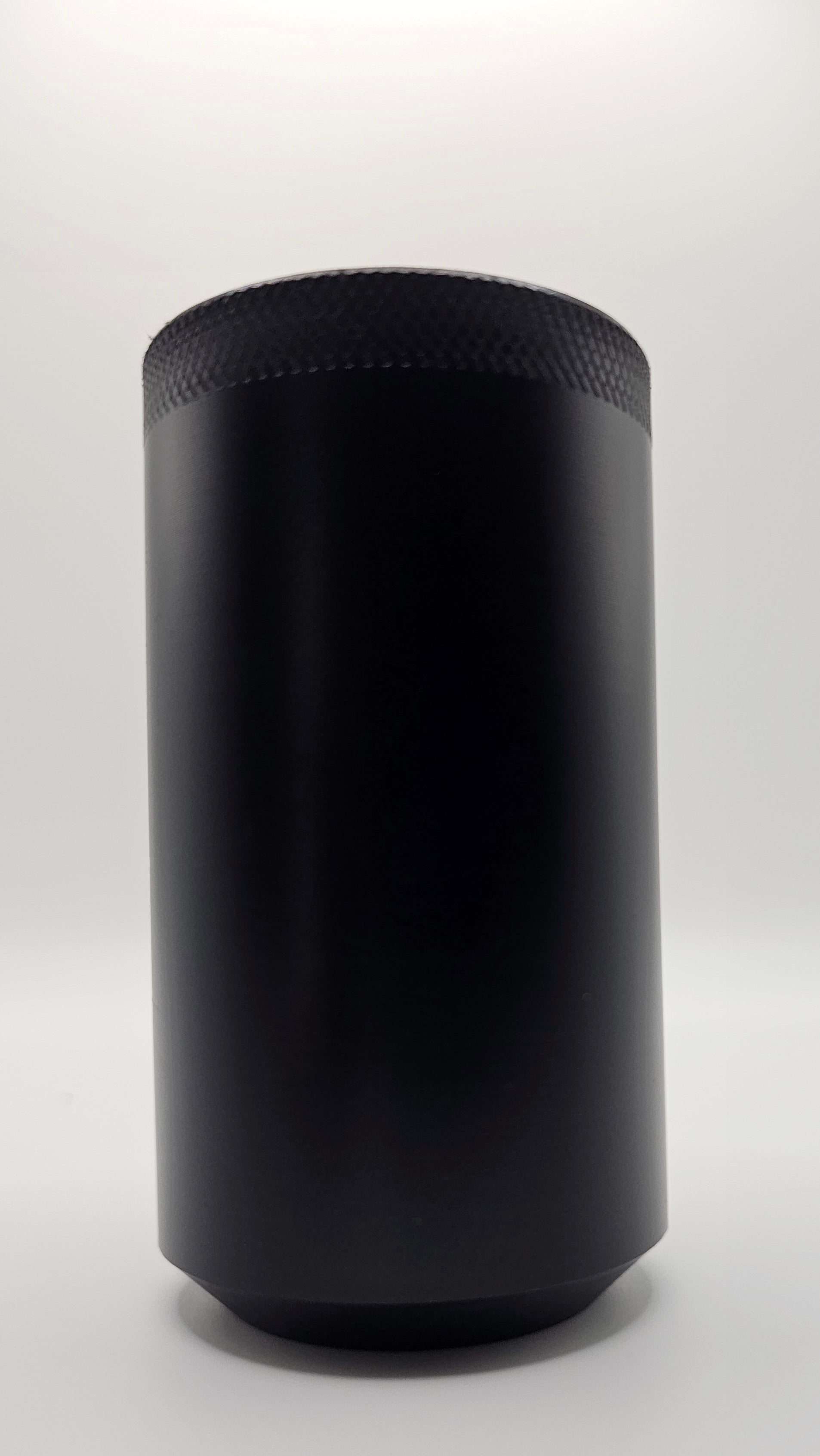 Black cylindrical container on a white background, shift knob, black, white, delrin, weighted, clean, tapered