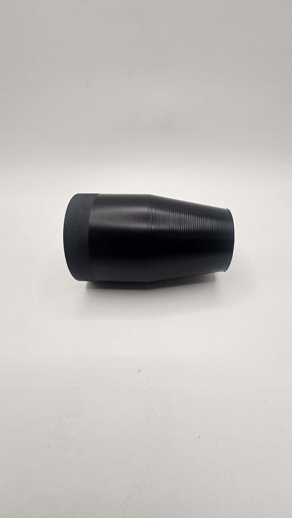 Black cylinder on a white background, shift knob, black, white, delrin, weighted, clean, tapered