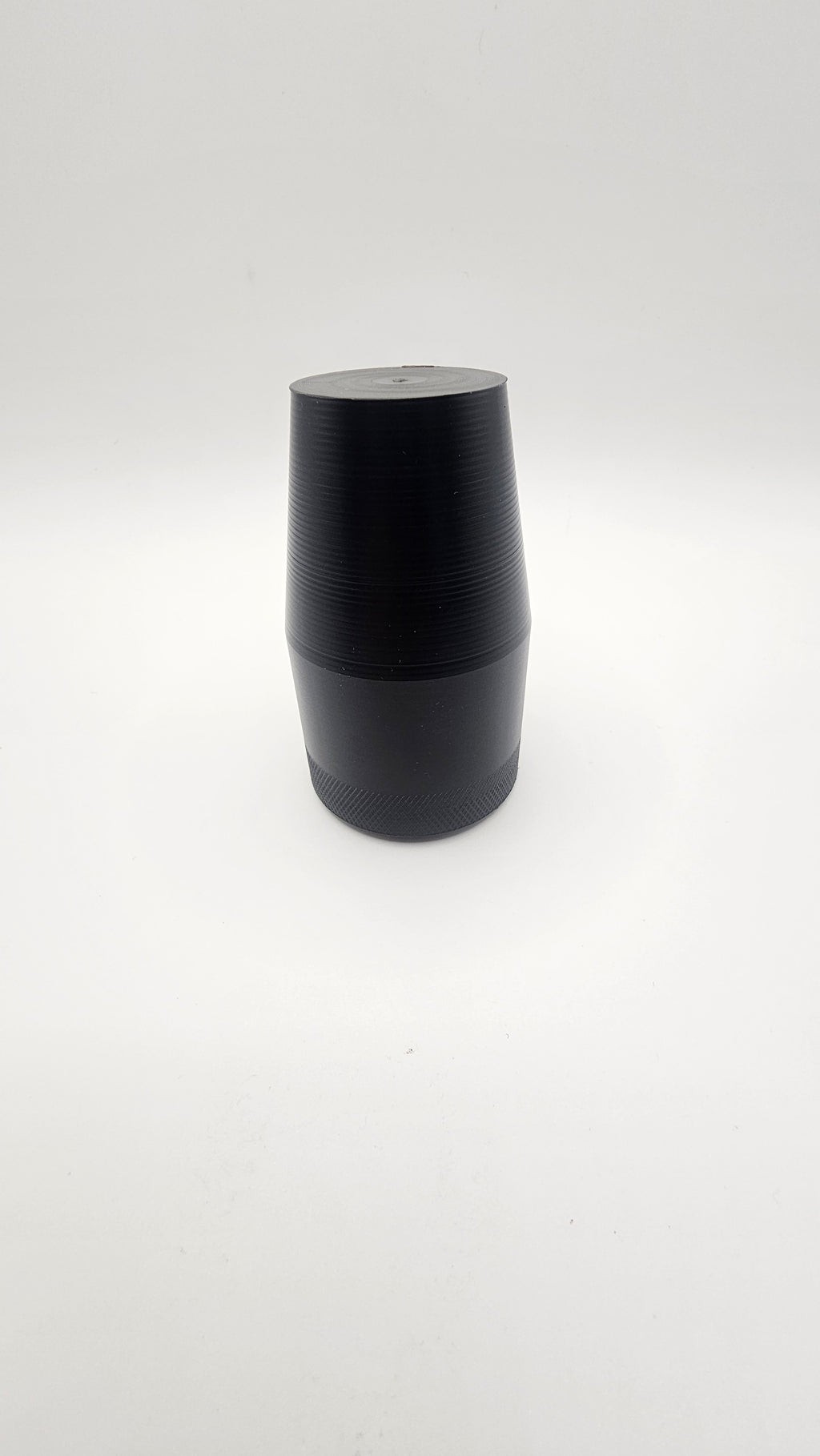 Black cylinder on a white background, shift knob, black, white, delrin, weighted, clean, tapered