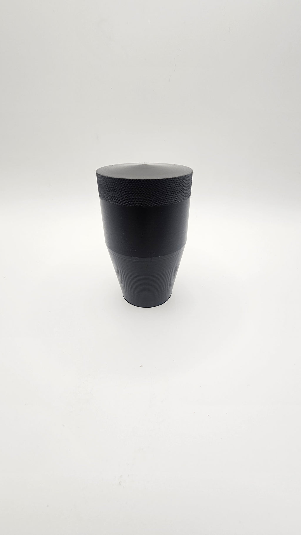 Black cylinder on a white background, shift knob, black, white, delrin, weighted, clean, tapered