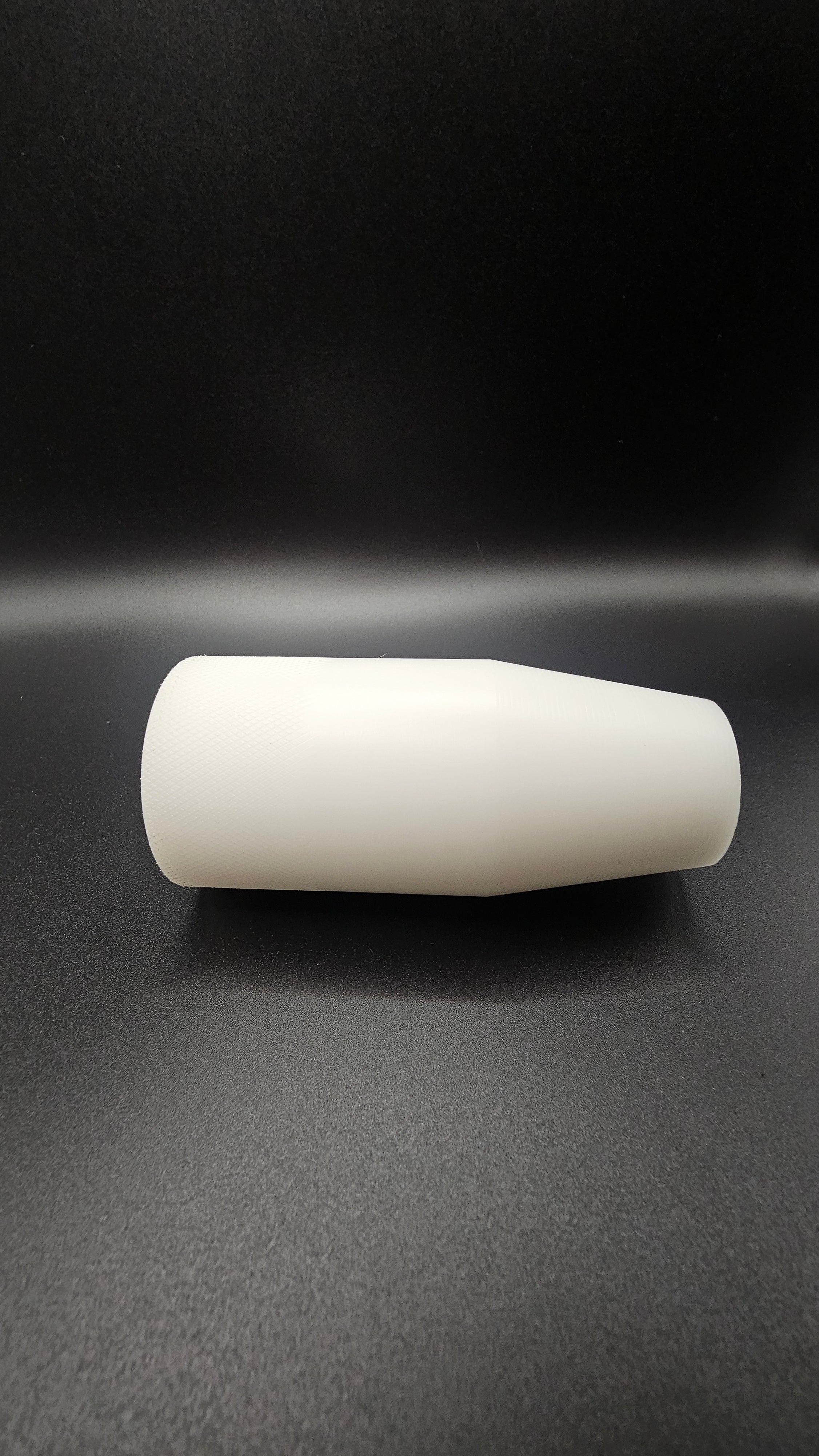 Black cylinder on a white background, shift knob, black, white, delrin, weighted, clean, tapered