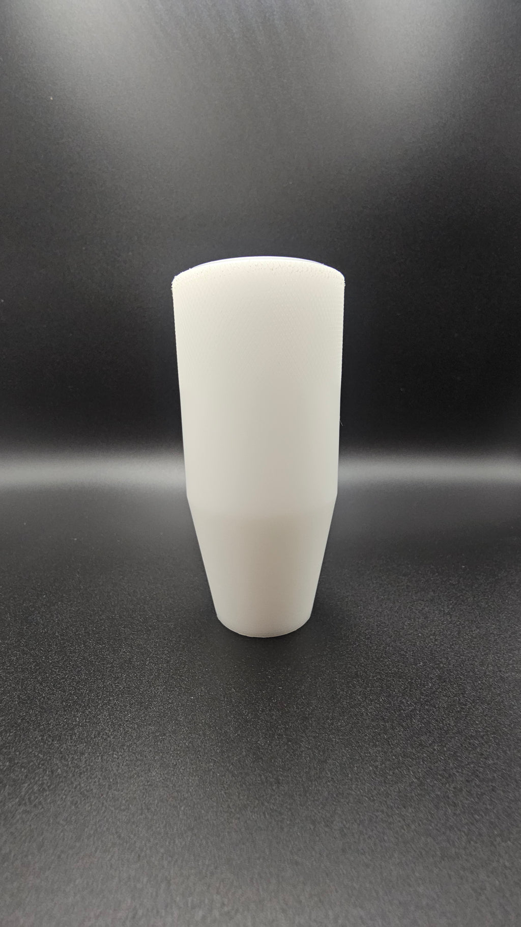Black cylinder on a white background, shift knob, black, white, delrin, weighted, clean, tapered
