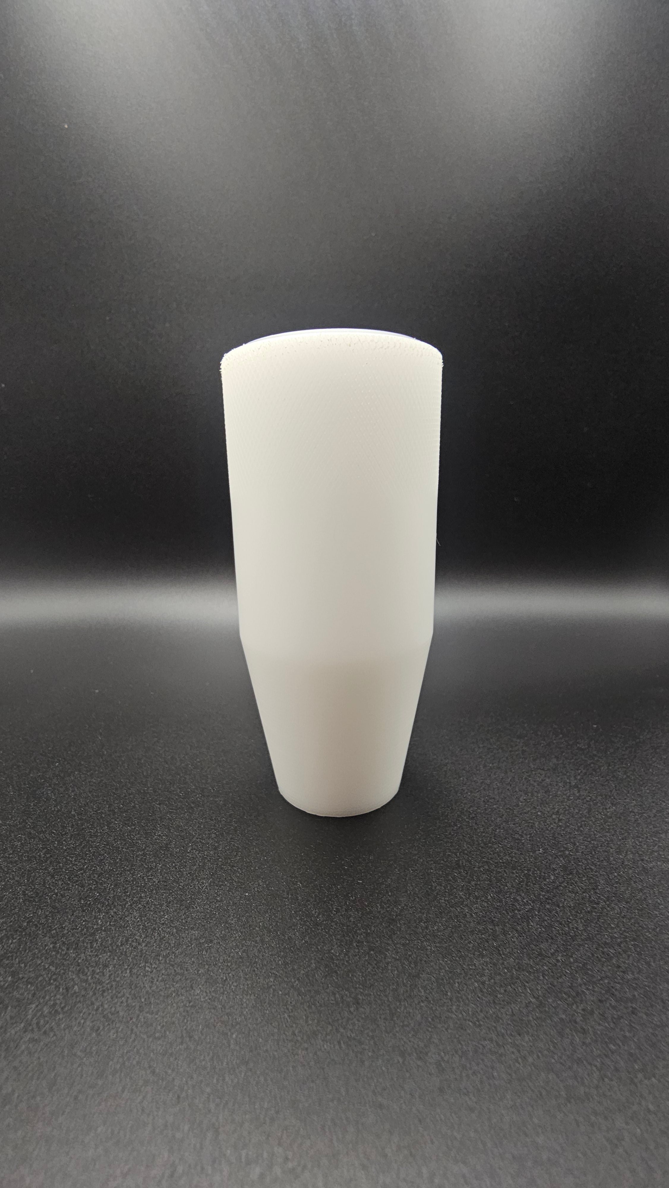 Black cylinder on a white background, shift knob, black, white, delrin, weighted, clean, tapered